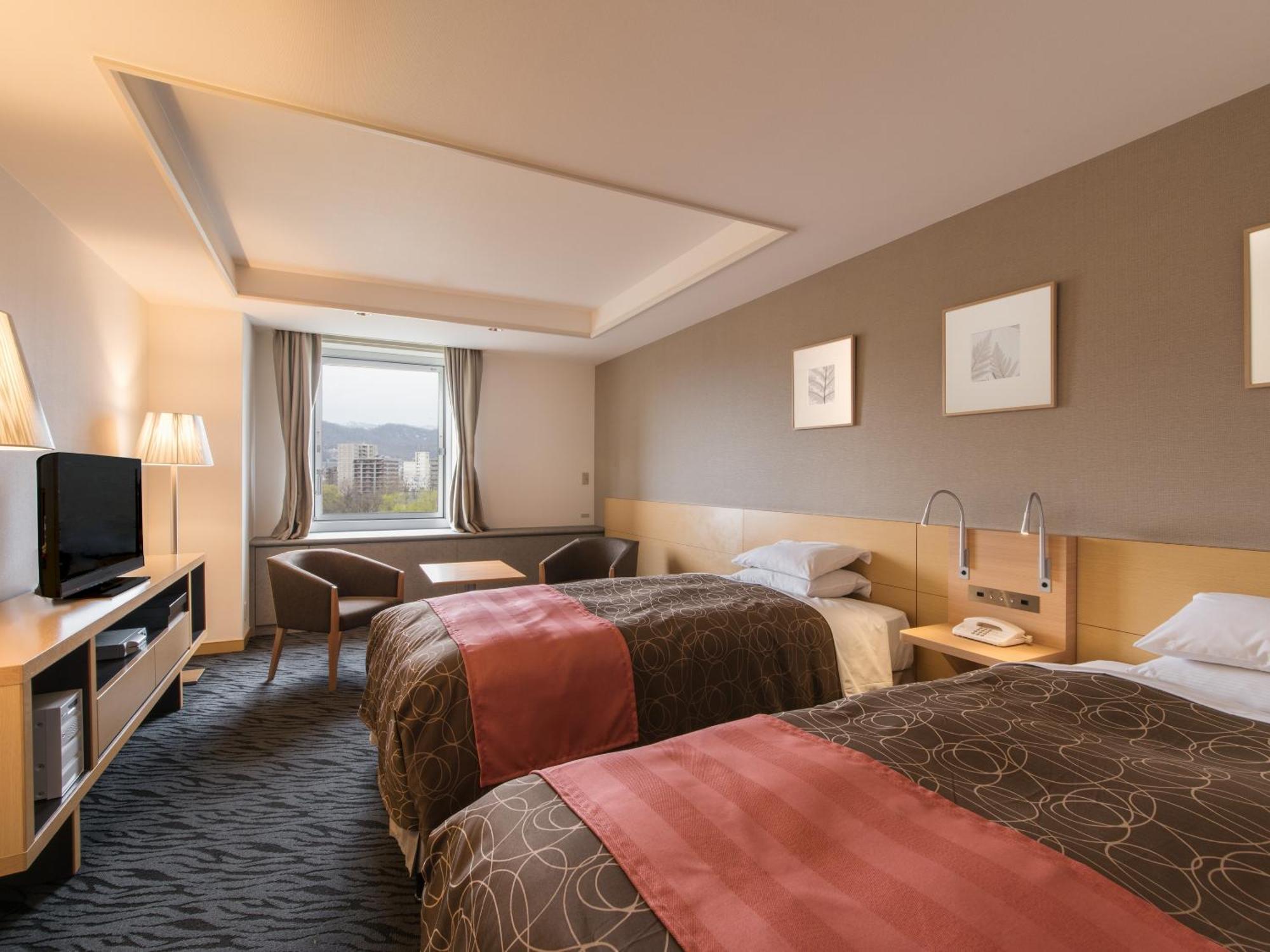 โรงแรมซัปโปโร ปาร์ค ห้อง รูปภาพ A typical room at the hotel
